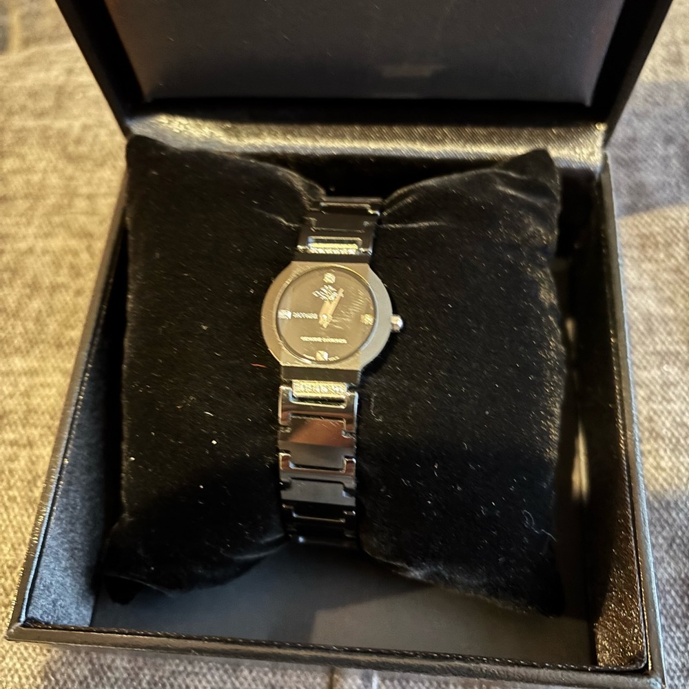 Black Movado Watch in excellent condition.